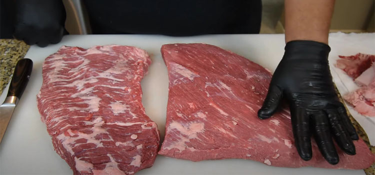 Chef Holding Raw Brisket