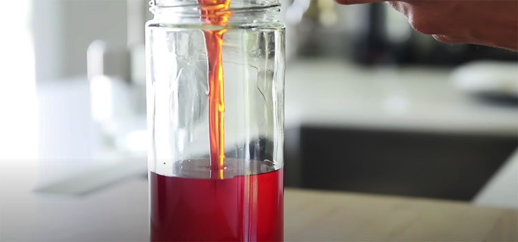 Pouring Chili Oil on a Jar