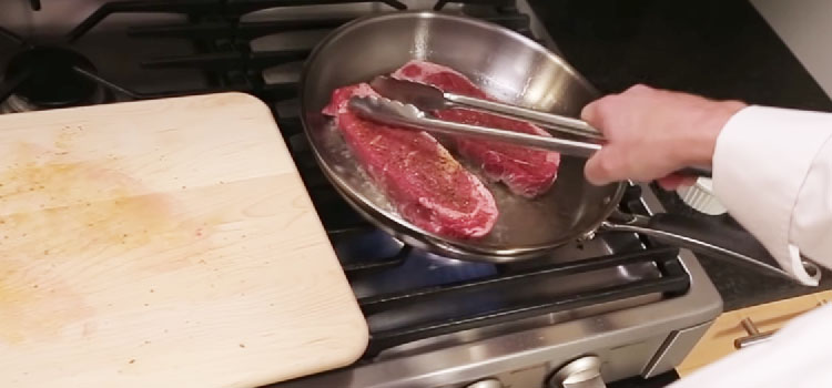 Chef Searing Steak