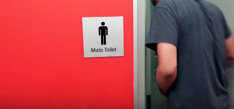 Man Going to Toilet