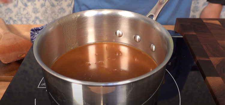 Person Making Gravy