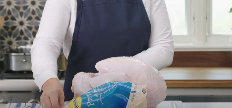 Person Opening Butterball Turkey