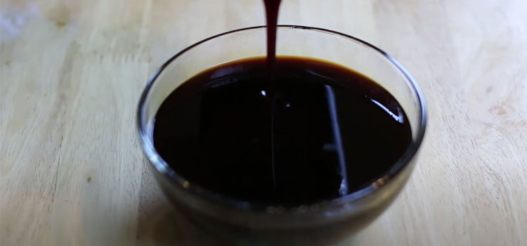 Pouring Eel Sauce on a Glass Bowl