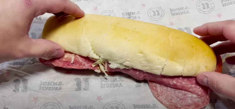 Hand Holding Jimmy John's Sandwich