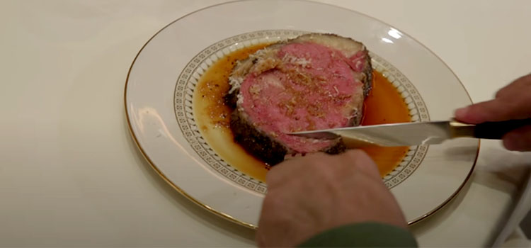 Person Eating Prime Rib