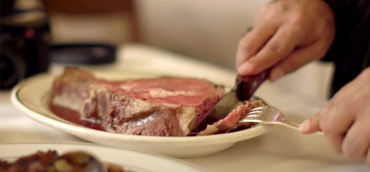 Person Eating Prime Rib