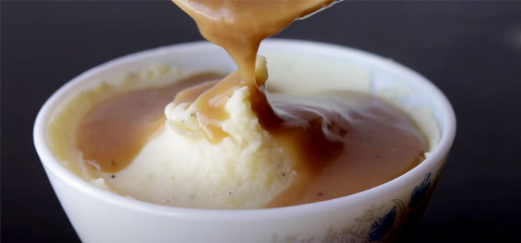 Pouring Gravy on a Mashed Potato