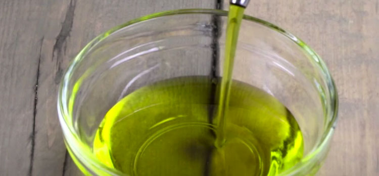 Pouring Oil on a Glass Bowl