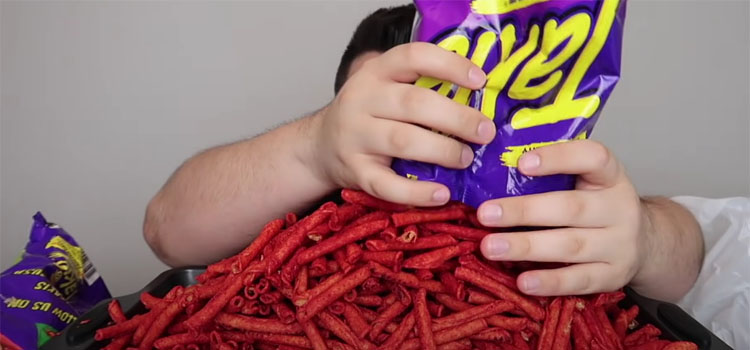 Pouring Takis