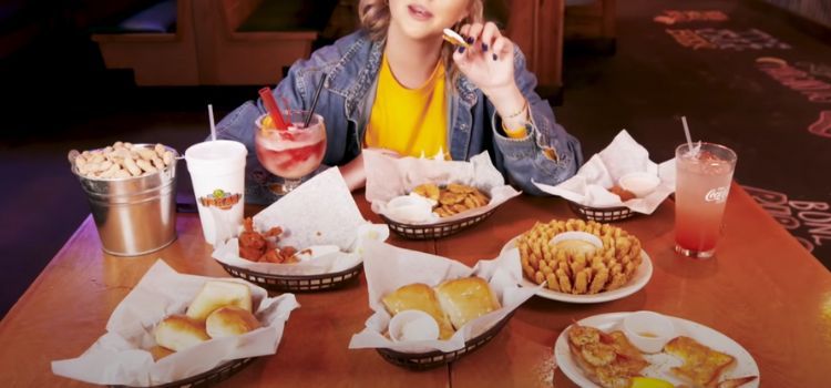 Woman Eating at a Restaurant